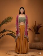 Layered Ochre Lehenga and Embellished Bandhani Cape