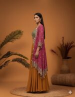 Layered Ochre Lehenga and Embellished Bandhani Cape