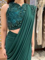 Royal green embellished drape saree