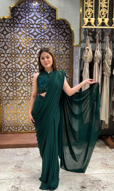 Royal green embellished drape saree
