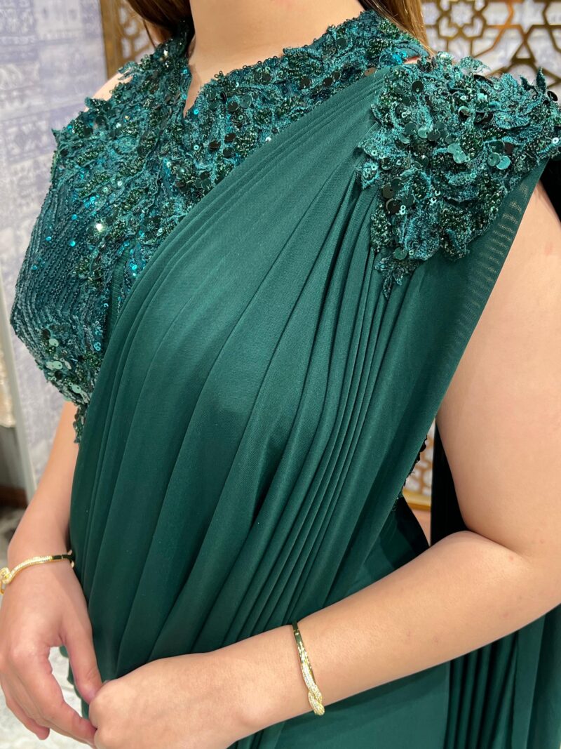 Royal green embellished drape saree