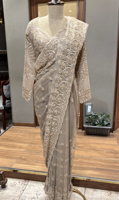 Champagne gold hand embroided saree
